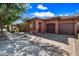 Charming single-story home with a private two-car garage and beautiful desert landscaping at 3850 E Geronimo St, Gilbert, AZ 85295