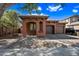Inviting single-story home with a private two-car garage and low-maintenance desert landscaping at 3850 E Geronimo St, Gilbert, AZ 85295