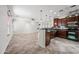 Open-concept kitchen featuring granite countertops and stainless steel appliances at 3850 E Geronimo St, Gilbert, AZ 85295