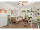 A bedroom with plenty of light and carpeted floors includes ample shelving at 4331 E Redwood Ln, Phoenix, AZ 85048