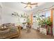 A bedroom with plenty of light and carpeted floors includes ample shelving at 4331 E Redwood Ln, Phoenix, AZ 85048