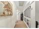 An interior hallway with neutral paint and artistic decor, featuring an ornate elephant painting at 4331 E Redwood Ln, Phoenix, AZ 85048