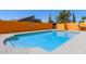 Backyard swimming pool with refreshing blue water, and a private fenced-in yard at 4331 E Redwood Ln, Phoenix, AZ 85048