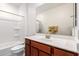 Clean bathroom with a bathtub, toilet and a vanity, offering a functional and pleasant space at 4562 S Park Grove St # 101, Gilbert, AZ 85297