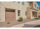 Side exterior featuring a private fenced yard and a mix of stone and siding accents at 4562 S Park Grove St # 101, Gilbert, AZ 85297