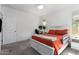 Comfortable bedroom with neutral walls and soft carpeting, offering a relaxing retreat at 4562 S Park Grove St # 101, Gilbert, AZ 85297