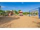 Community playground with slides, swings, and ample space for play and recreation at 4562 S Park Grove St # 101, Gilbert, AZ 85297