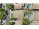 Overhead view of a home showcasing backyard, nearby pool and neighborhood at 4566 E La Costa Dr, Chandler, AZ 85249