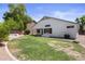 Spacious backyard featuring a grass area and low-maintenance desert landscaping at 4566 E La Costa Dr, Chandler, AZ 85249