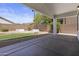 View of the backyard with a covered patio and minimal landscaping at 4566 E La Costa Dr, Chandler, AZ 85249