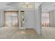 Inviting foyer with tile flooring and large windows, offers a warm and welcoming feel at 4566 E La Costa Dr, Chandler, AZ 85249