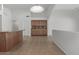 Bright kitchen with tile floor, central island and wood cabinets at 4566 E La Costa Dr, Chandler, AZ 85249