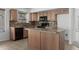 Kitchen with tile floor, central island and stainless appliances at 4566 E La Costa Dr, Chandler, AZ 85249