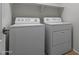 Laundry room with tile floor and side-by-side washer and dryer at 4566 E La Costa Dr, Chandler, AZ 85249