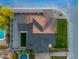 Overhead shot of roof with gray shingles and rectangular backyard lawn at 4813 E Earll Dr, Phoenix, AZ 85018