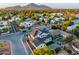 Wonderful aerial view of a meticulously landscaped neighborhood featuring a modern two story home and mountain views at 4813 E Earll Dr, Phoenix, AZ 85018