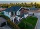 Beautiful aerial view of a modern luxury home surrounded by mature landscaping and neighborhood views at 4813 E Earll Dr, Phoenix, AZ 85018
