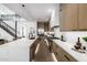 Gourmet kitchen includes sleek countertops, custom cabinetry, and stainless steel appliances at 4813 E Earll Dr, Phoenix, AZ 85018