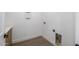 Laundry room features utility hookups, light wood vinyl flooring, and plenty of space at 4813 E Earll Dr, Phoenix, AZ 85018