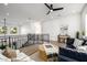Upstairs living room with a fan and access to a balcony at 4813 E Earll Dr, Phoenix, AZ 85018