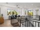 Upstairs living room with exterior views and access to a balcony at 4813 E Earll Dr, Phoenix, AZ 85018