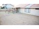Large backyard featuring a grass area and covered patio at 5515 E Elena Ave, Mesa, AZ 85206