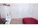 Bedroom with a desk and cabinets with closed doors at 5515 E Elena Ave, Mesa, AZ 85206