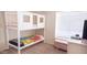 Cozy bedroom with a white bunk bed frame and carpeted floors at 5515 E Elena Ave, Mesa, AZ 85206