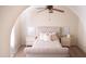 Comfortable bedroom with a tufted headboard bed, matching nightstands, and neutral decor at 5515 E Elena Ave, Mesa, AZ 85206