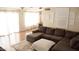 Inviting living room with a comfortable sectional sofa, stylish decor, and ample natural light at 5515 E Elena Ave, Mesa, AZ 85206