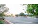 View of a parking lot area with trees and landscaping at 5515 E Elena Ave, Mesa, AZ 85206