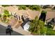 Spacious home featuring desert landscaping, a driveway, and a lush tree at 5731 W Gail Dr, Chandler, AZ 85226