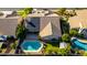 A beautiful home aerial view featuring solar panels, pool, and meticulously kept backyard at 5731 W Gail Dr, Chandler, AZ 85226