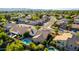 An aerial view of a lovely community and a home with solar panels and a pool at 5731 W Gail Dr, Chandler, AZ 85226