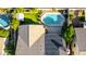 A lovely aerial view of a home showcasing the pool, new turf, and roof solar panels at 5731 W Gail Dr, Chandler, AZ 85226
