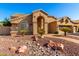 Stunning single-story home with a welcoming entrance and low maintenance desert landscaping at 5731 W Gail Dr, Chandler, AZ 85226