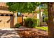 Exterior view featuring a well-maintained yard and privacy gate to the backyard at 5731 W Gail Dr, Chandler, AZ 85226