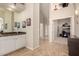 Hallway featuring a wet bar and access to bedrooms at 5731 W Gail Dr, Chandler, AZ 85226