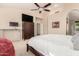 Spacious main bedroom with vaulted ceiling, fan, and large wardrobe at 5731 W Gail Dr, Chandler, AZ 85226
