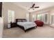 Spacious main bedroom with vaulted ceiling, plantation shutters, and a large window at 5731 W Gail Dr, Chandler, AZ 85226
