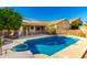 Backyard featuring a large pool, secure fencing, with a clear view of the home at 5731 W Gail Dr, Chandler, AZ 85226