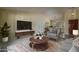 Inviting living room with neutral tones, modern furnishings, and ample natural light at 6101 E Beck Ln, Scottsdale, AZ 85254
