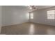 Bright bedroom with modern ceiling fan and natural light is comfortable and welcoming at 7205 W Ellis St, Laveen, AZ 85339