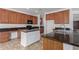 Spacious kitchen with ample counter space, white island, and plenty of storage at 7205 W Ellis St, Laveen, AZ 85339