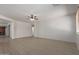 Bright, open living room with ceiling fan and neutral decor offers a welcoming space at 7205 W Ellis St, Laveen, AZ 85339