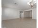 Large living room featuring wood-look floors and bright, neutral paint at 7205 W Ellis St, Laveen, AZ 85339