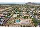 Aerial view of a neighborhood showing proximity to schools and featuring large properties with putting greens at 7205 W Fallen Leaf Ln, Peoria, AZ 85383