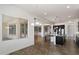Modern kitchen featuring granite countertops, stainless steel appliances, and dark cabinetry at 7205 W Fallen Leaf Ln, Peoria, AZ 85383