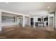 Expansive open-concept layout showcasing living, dining, and kitchen areas for seamless living at 7205 W Fallen Leaf Ln, Peoria, AZ 85383
