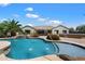 Resort-style pool and spa with water features and lush landscaping, offering a relaxing outdoor retreat at 7205 W Fallen Leaf Ln, Peoria, AZ 85383
